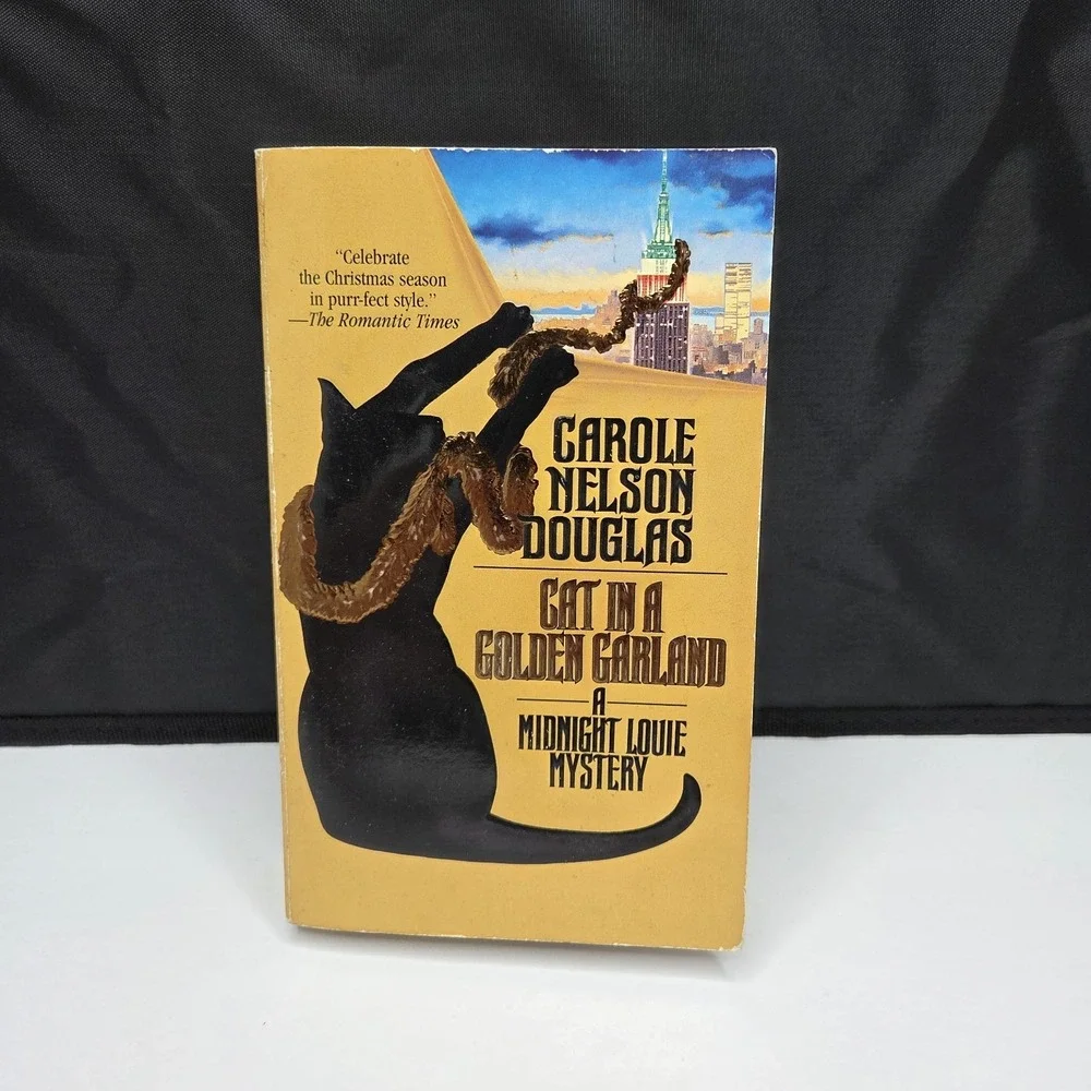 Cat in a Golden Garland by Carole Nelson Douglas Midnight Louie Mystery